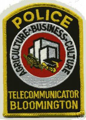 Bloomington Police Telecommunicator (Illinois)
Thanks to Jason Bragg for this scan.
