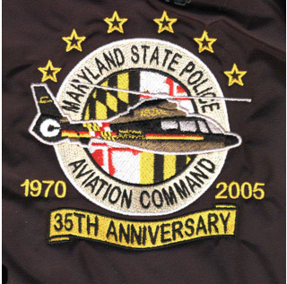 Mayland State Aviation Command 35th Anniversary (Maryland)
Thanks to Dawnsfalcon for this scan.
Designed by: Gene M. Stevens
Keywords: helicopter