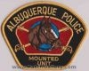 Albuquerque_Police_patches_-_Mounted_Unit_-_Black_with_gold_border.jpg