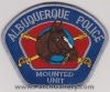 Albuquerque_Police_patches_-_Mounted_Unit_-_Blue_with_silver_border.jpg