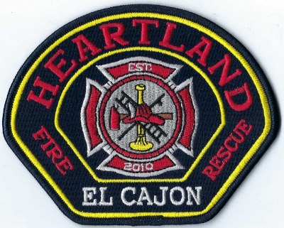 Heartland (El Cajon) Fire Department (CA)
Three Fire Departments merged to create Heartland.  DEFUNCT -  El Cajon. Patch with the word El Cajon no longer worn.
